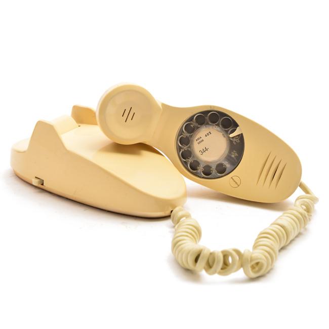 Beige Rotary Phone with Unique Shape