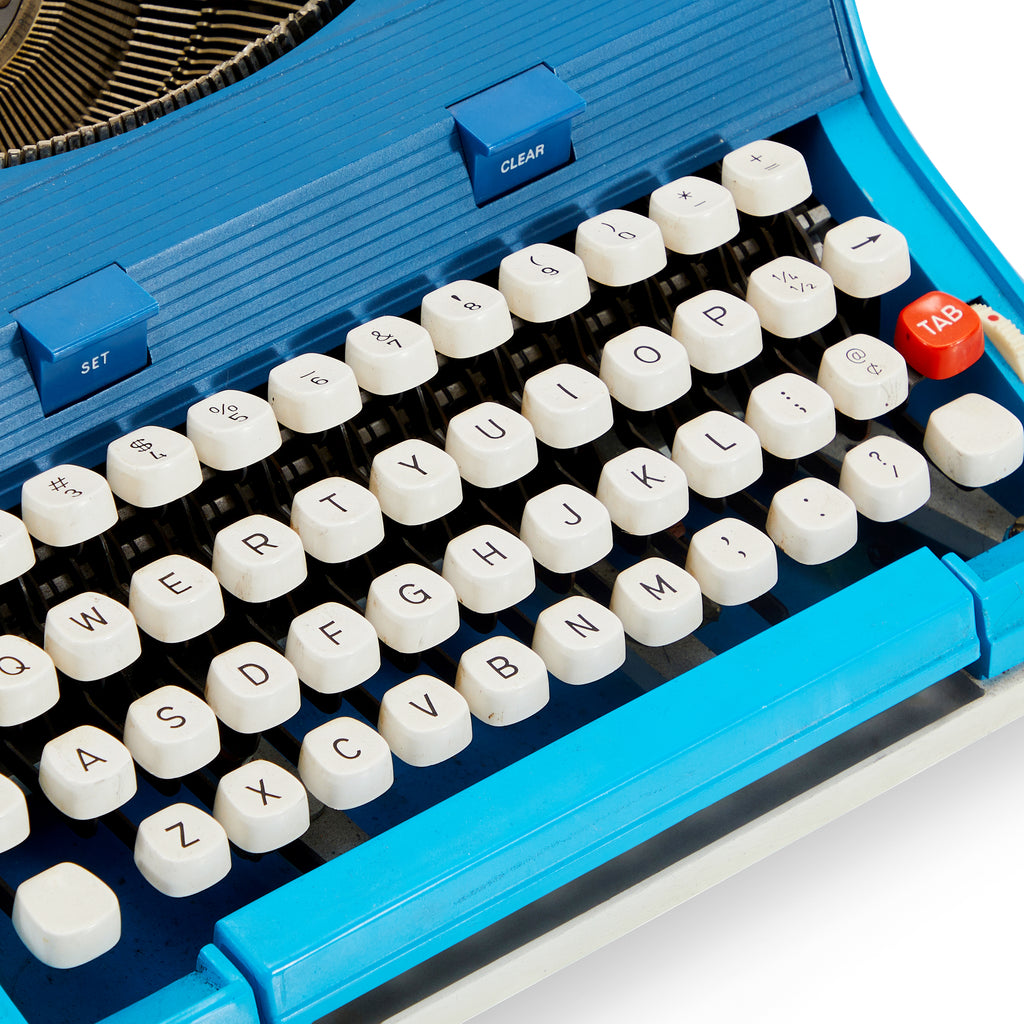 Blue Sears Malibu Portable Typewriter