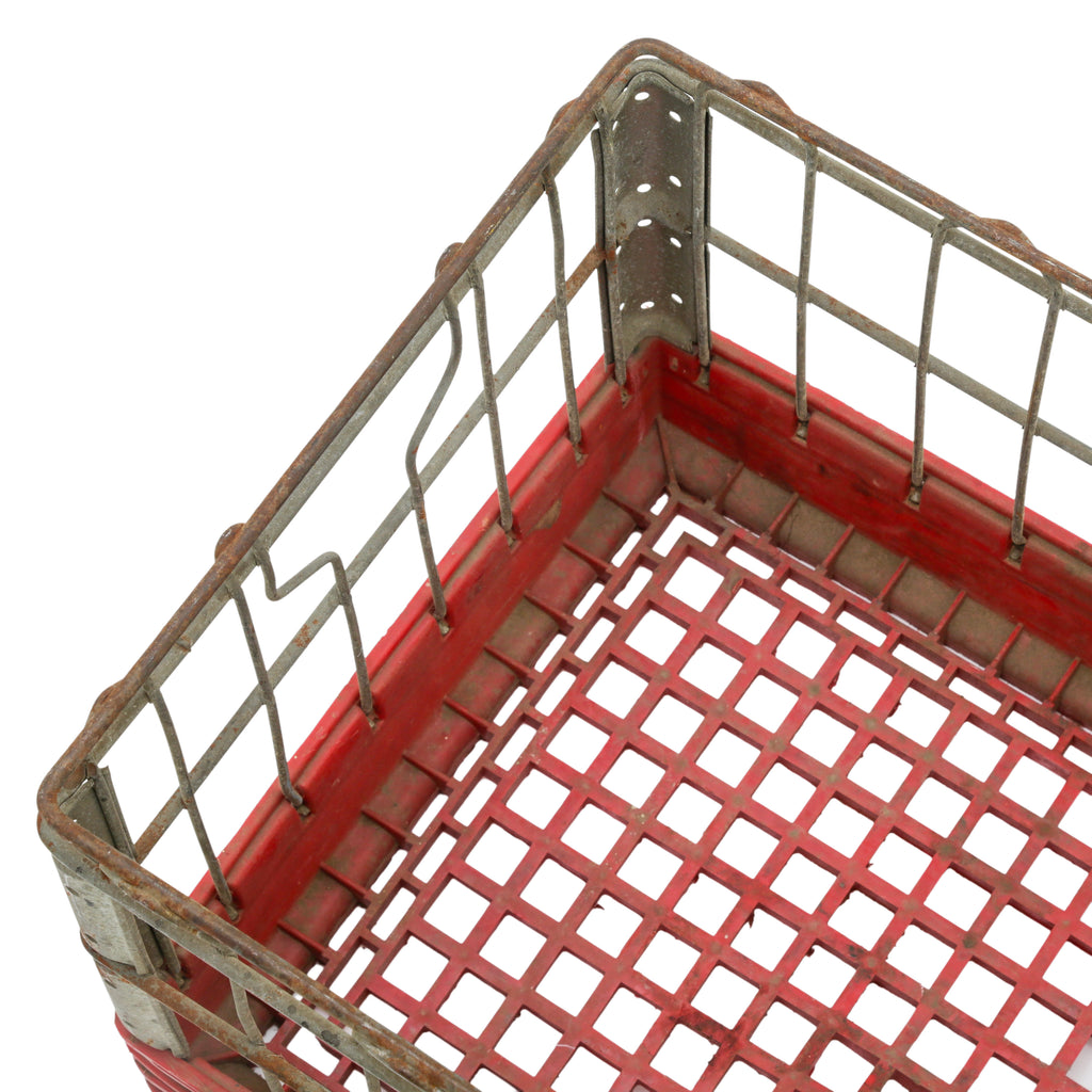 Red Plastic and Metal Milk Crate