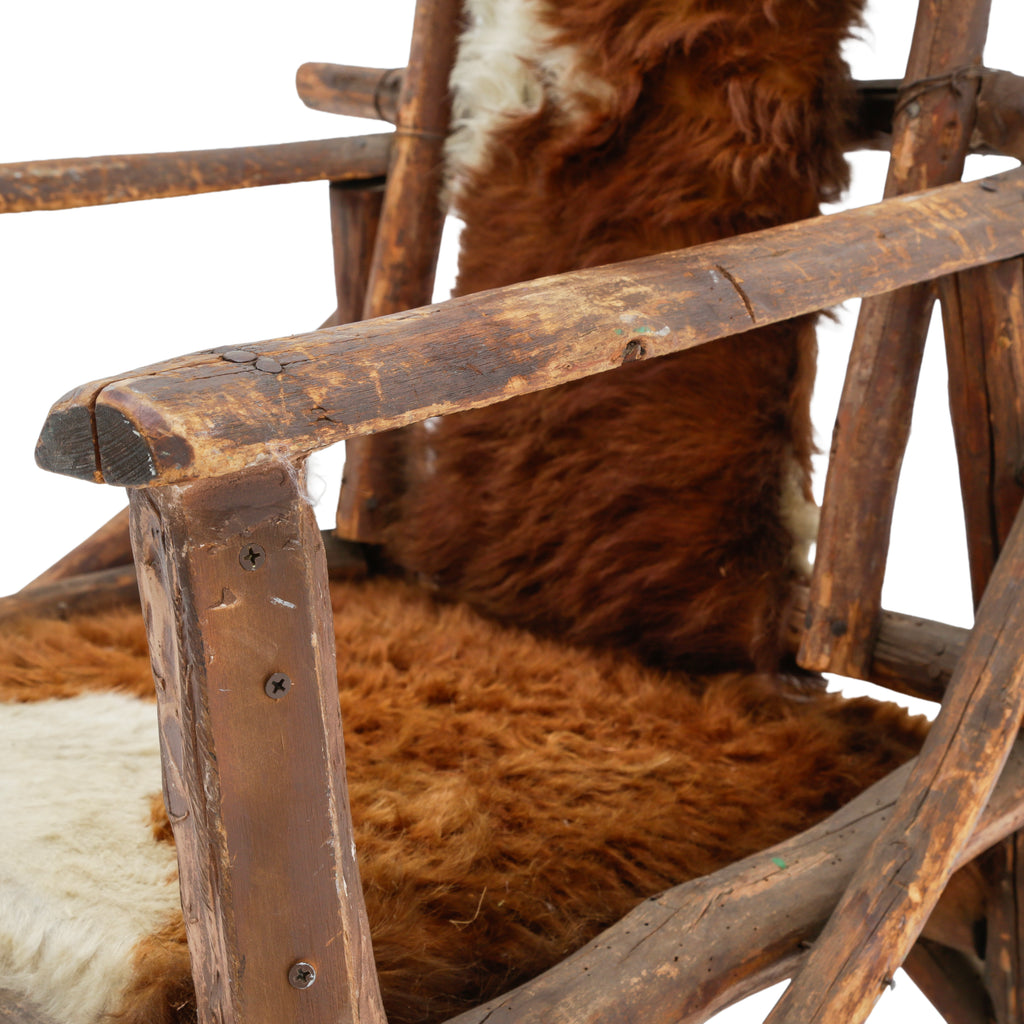Raw Wood Armchair with Brown and White Animal Hide Fur