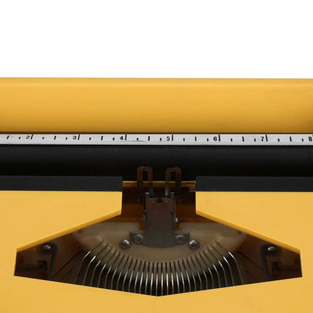 Yellow JC Penney Light Touch Typewriter