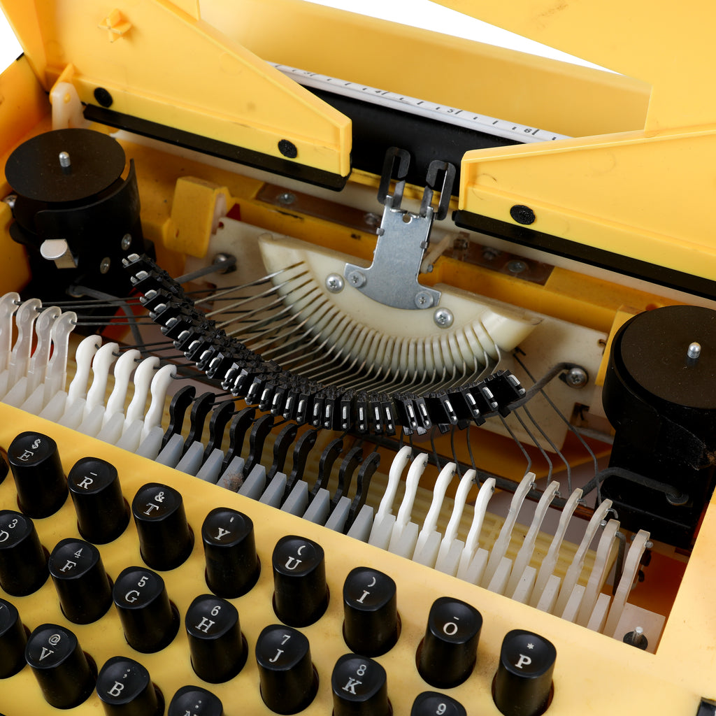 Yellow JC Penney Light Touch Typewriter