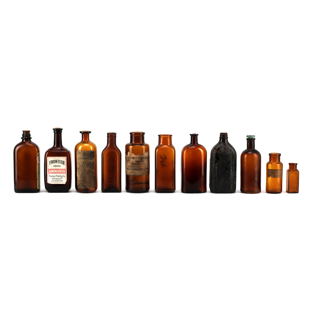 Brown Glass Medicine Bottle w/ Green Label (A+D)