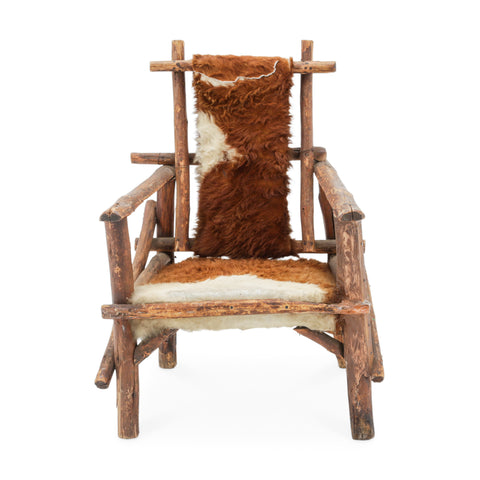 Raw Wood Armchair with Brown and White Animal Hide Fur