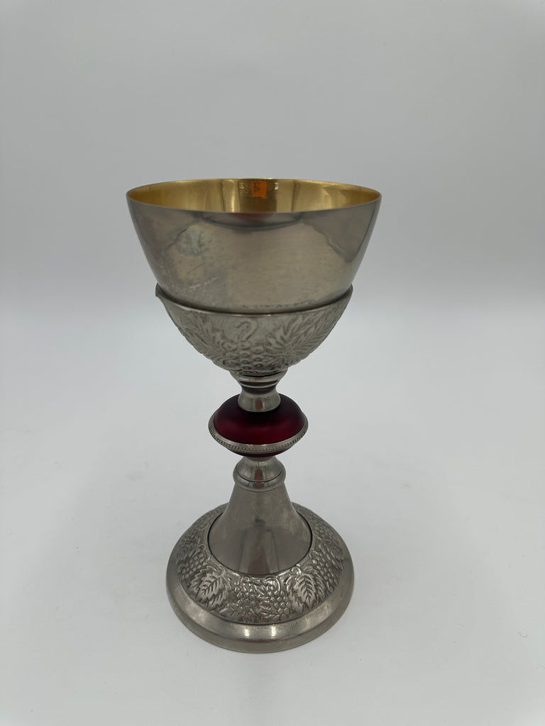 Ornate Silver and Gold Chalice with Embossed Grape Motif and Ruby Red Accent