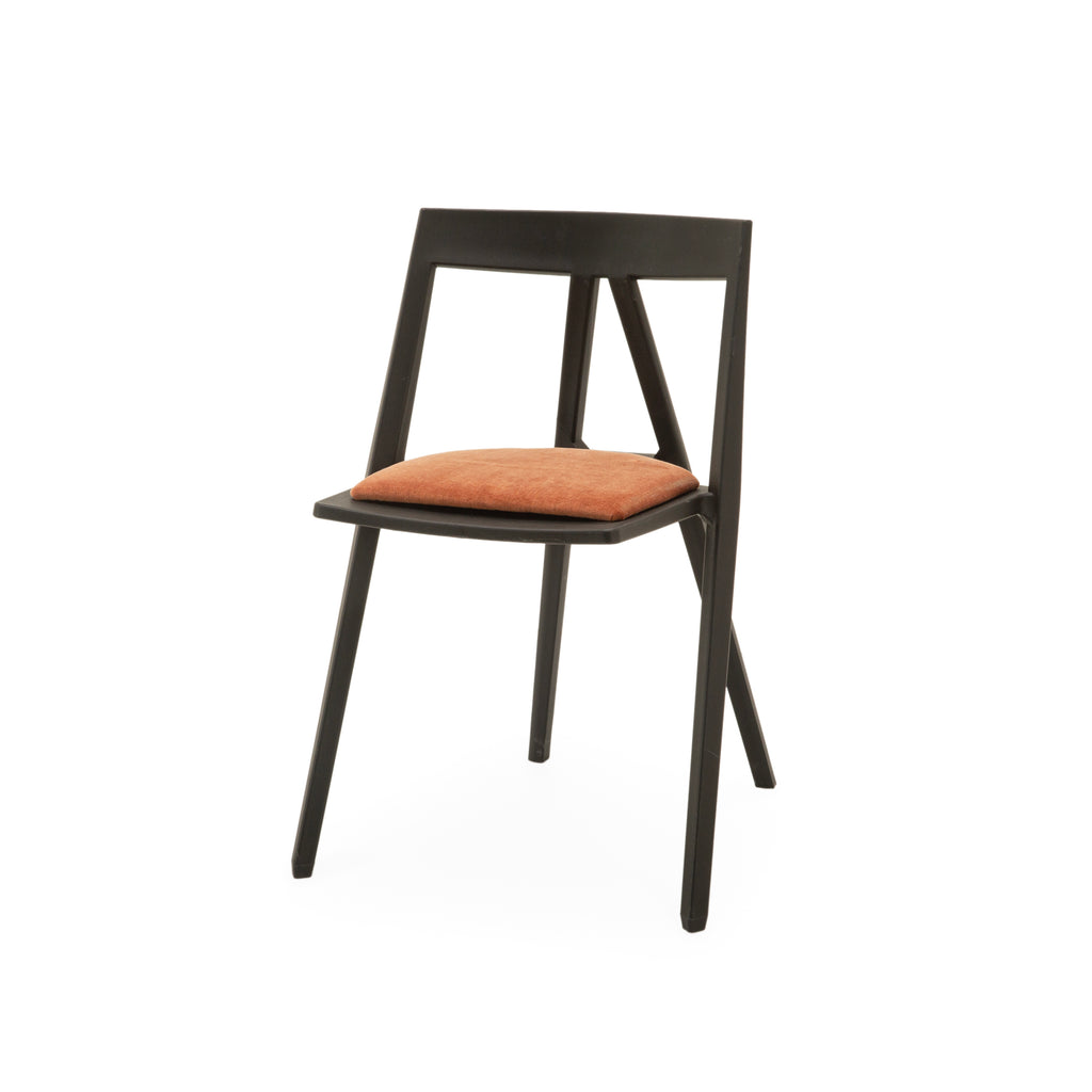 Matte Black Wood Dining Chair with Burnt Orange Upholstered Seat