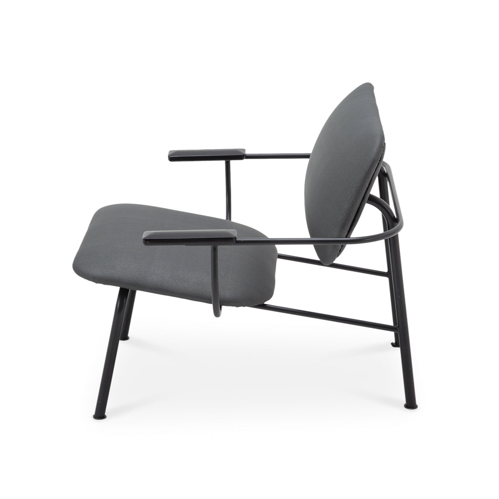 Dark Gray Upholstered Armchair with Black Metal Frame and Armrests
