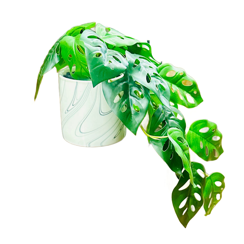 Vibrant Green Artificial Plant in Marbled Ceramic Planter
