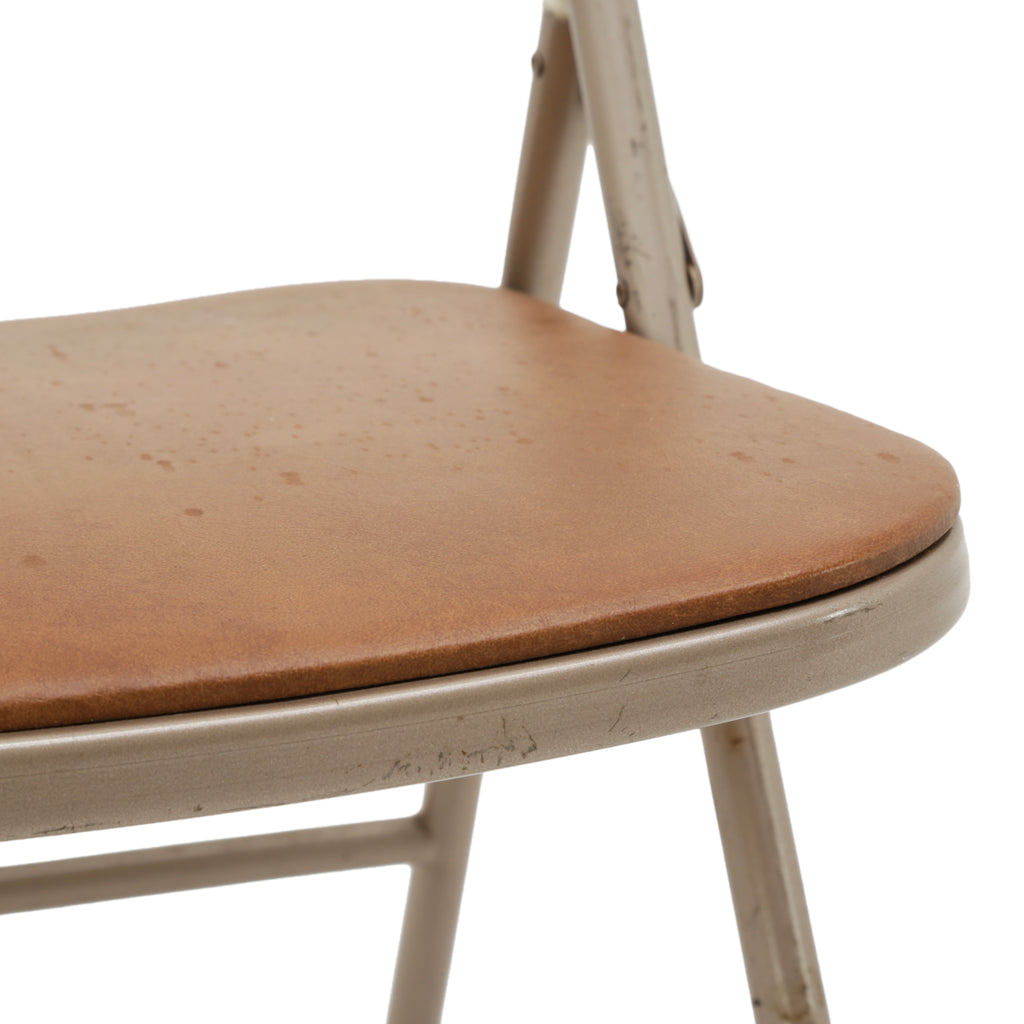 Beige Metal Folding Chair