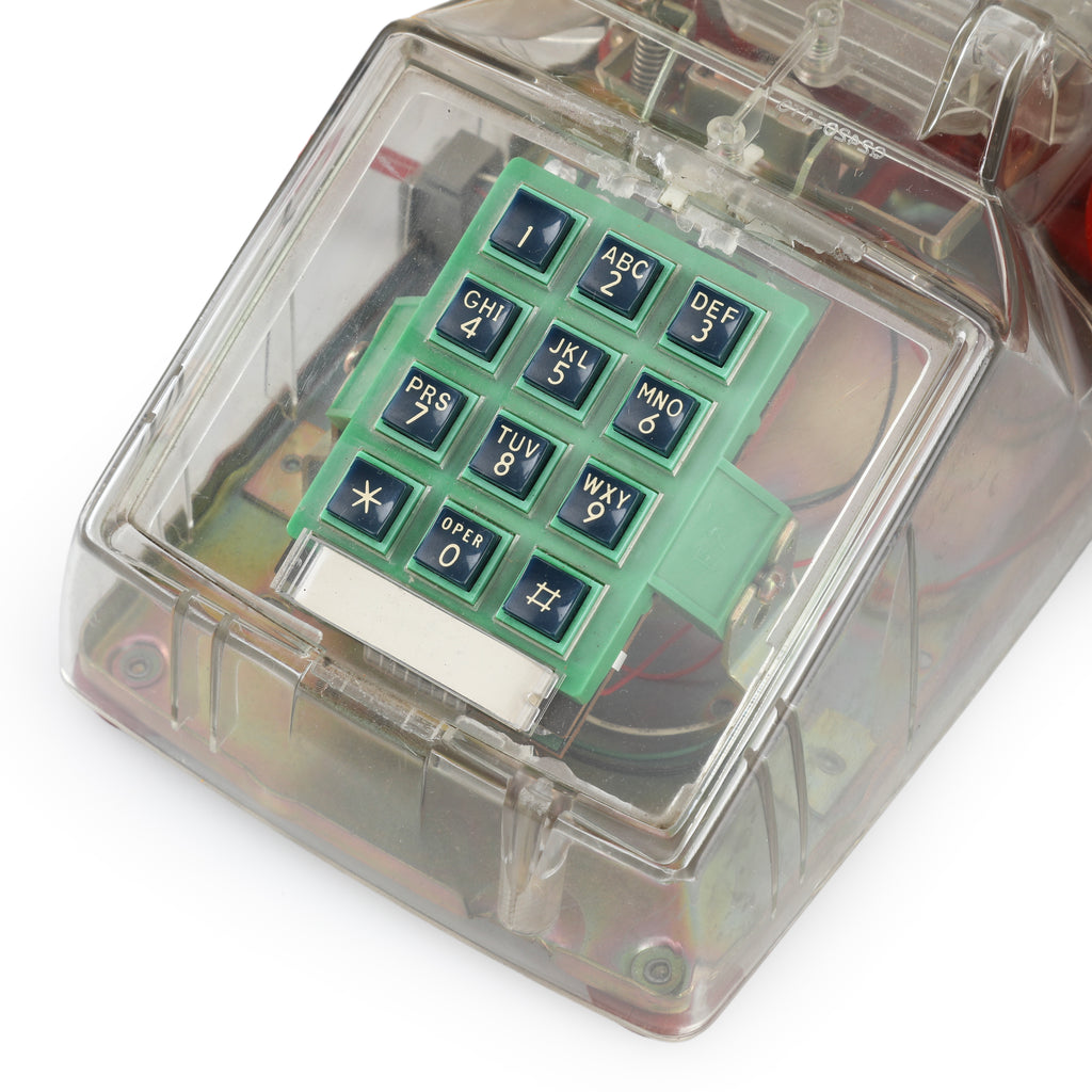 Clear Plastic Push-Button Telephone with Red Coiled Cord