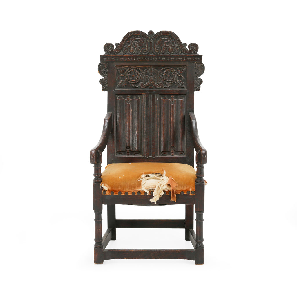 Distressed Dark Oak Carved Jacobean Armchair