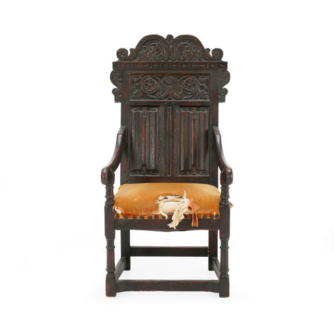 Distressed Dark Oak Carved Jacobean Armchair