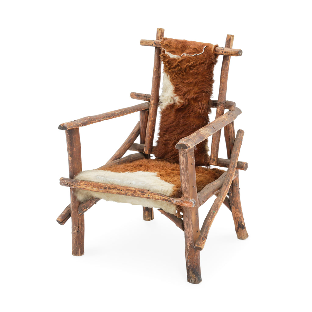 Raw Wood Armchair with Brown and White Animal Hide Fur