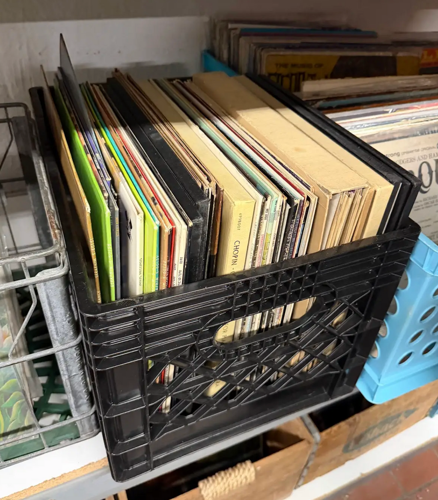 Black Plastic Milk Crate with Assorted Vintage Vinyl Records