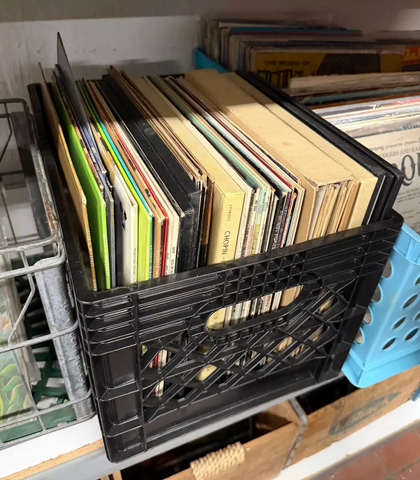 Black Plastic Milk Crate with Assorted Vintage Vinyl Records