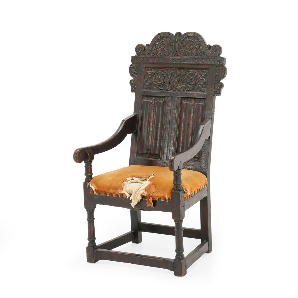 Distressed Dark Oak Carved Jacobean Armchair
