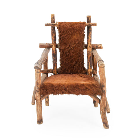 Raw Wood Armchair with Brown Animal Hide Fur