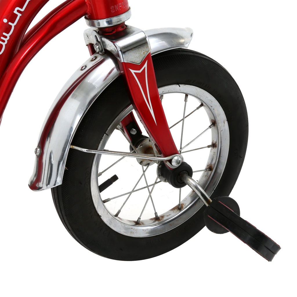 Red Schwinn Tricycle