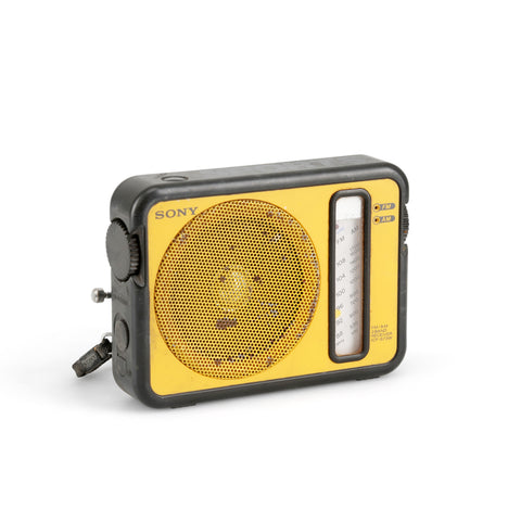 Rustic Yellow Sony Hand Radio