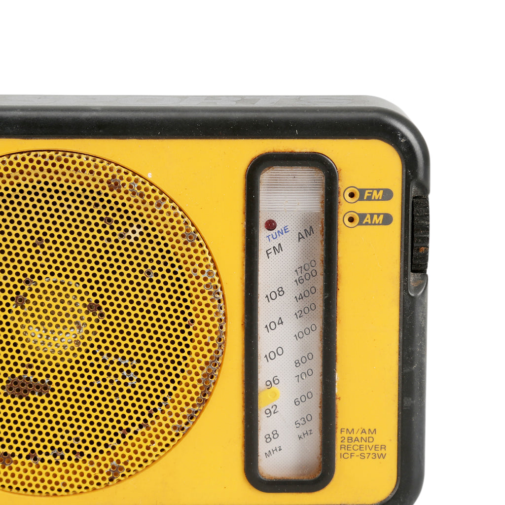Rustic Yellow Sony Hand Radio