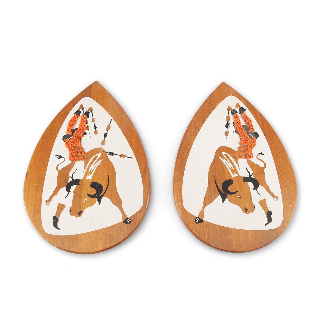 Pair of Small Textured Wood Matador Artworks