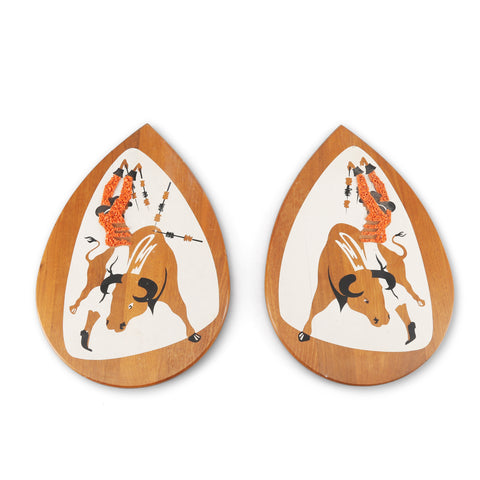 Pair of Small Textured Wood Matador Artworks