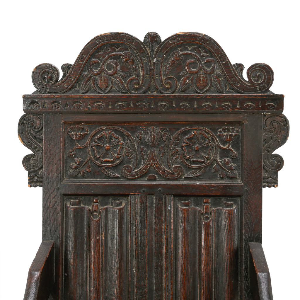 Distressed Dark Oak Carved Jacobean Armchair