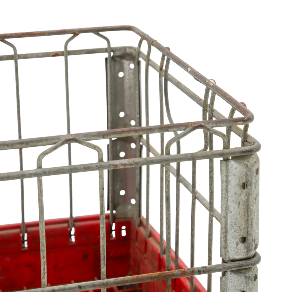 Red Plastic and Metal Milk Crate