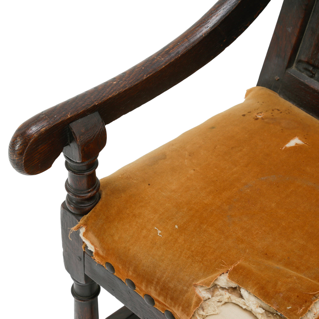 Distressed Dark Oak Carved Jacobean Armchair