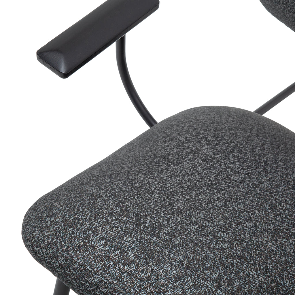 Dark Gray Upholstered Armchair with Black Metal Frame and Armrests