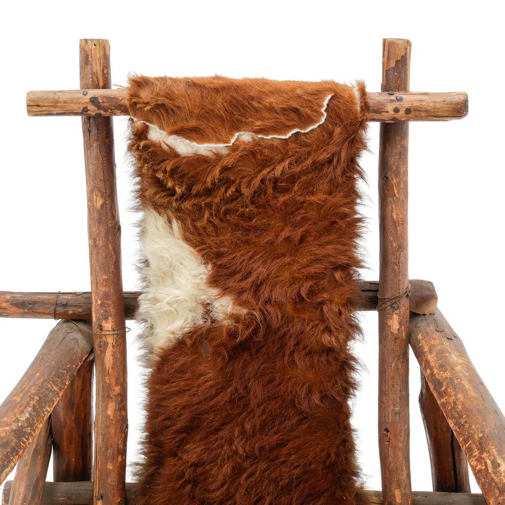 Raw Wood Armchair with Brown and White Animal Hide Fur