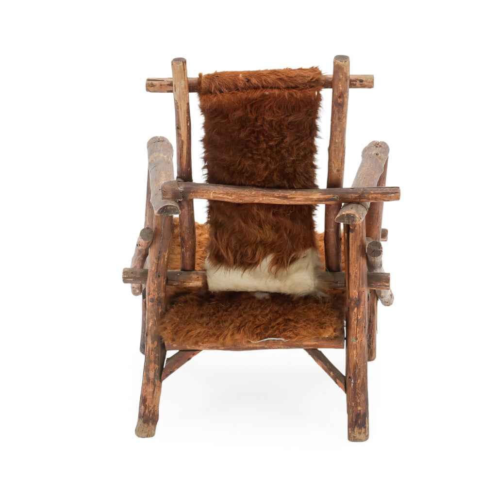 Raw Wood Armchair with Brown and White Animal Hide Fur