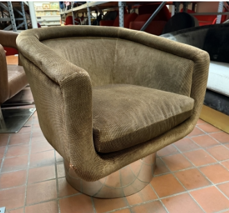 Green swivel lounge chair