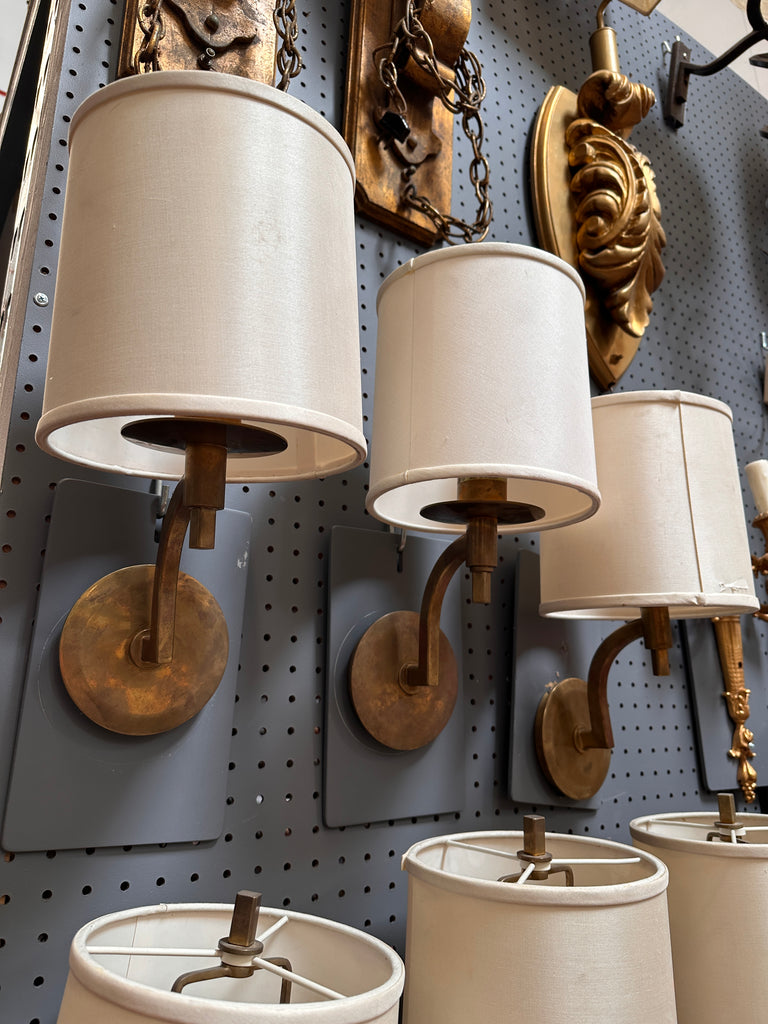 Aged Brass Wall Sconce with Cream Fabric Drum Shade
