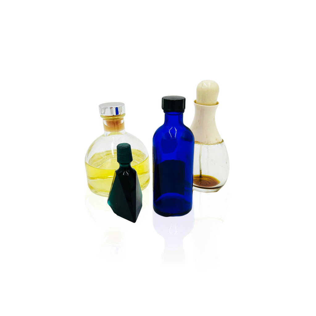 Assorted Tincture and Perfume Bottles