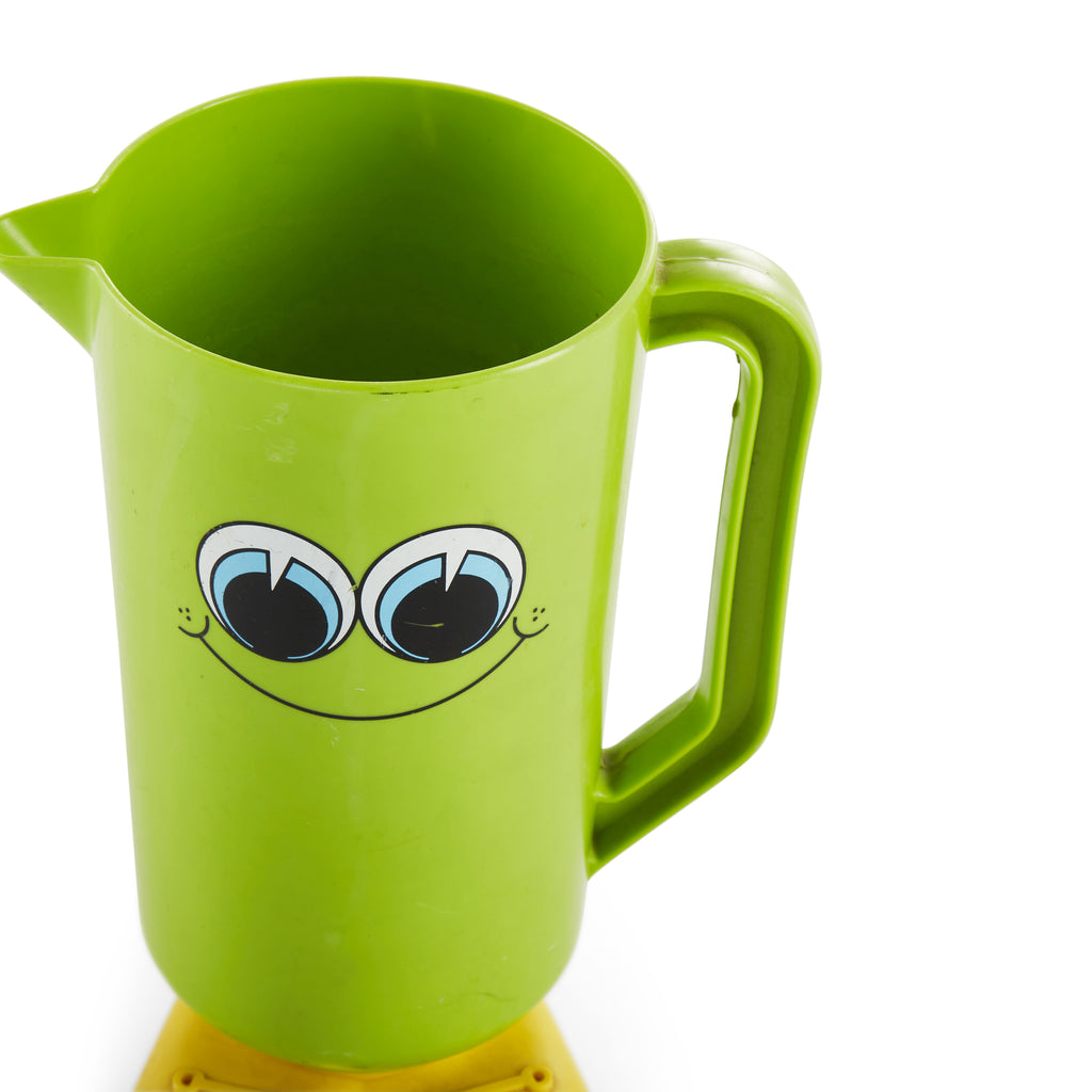 Green smiley face plastic cup