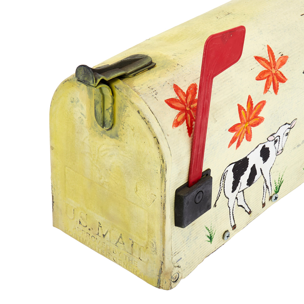 Yellow Painted Mailbox With Cow Art