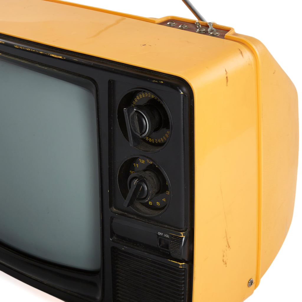 Sanyo Yellow TV with Antenna and Knobs