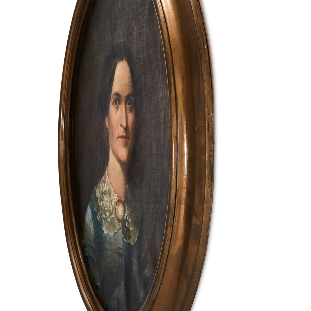 Gold Framed Round Female Portrait