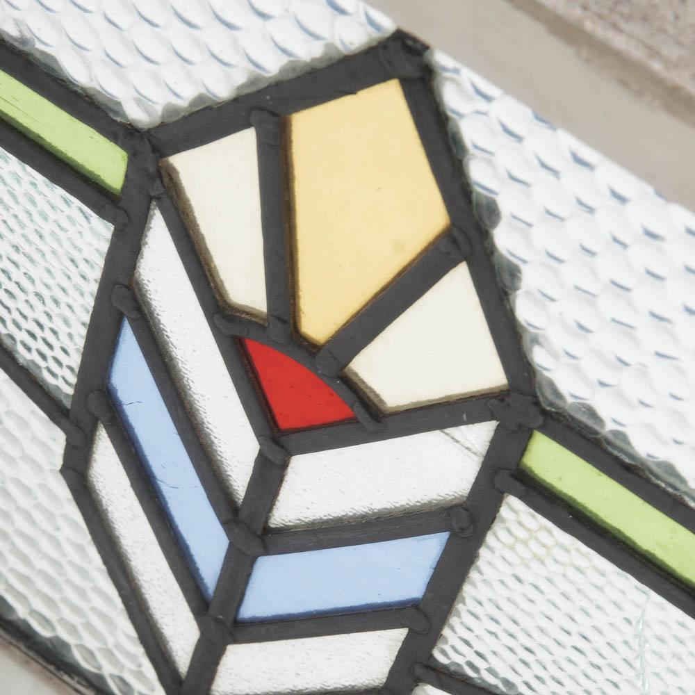 Geometric Stained Glass in Window Frame