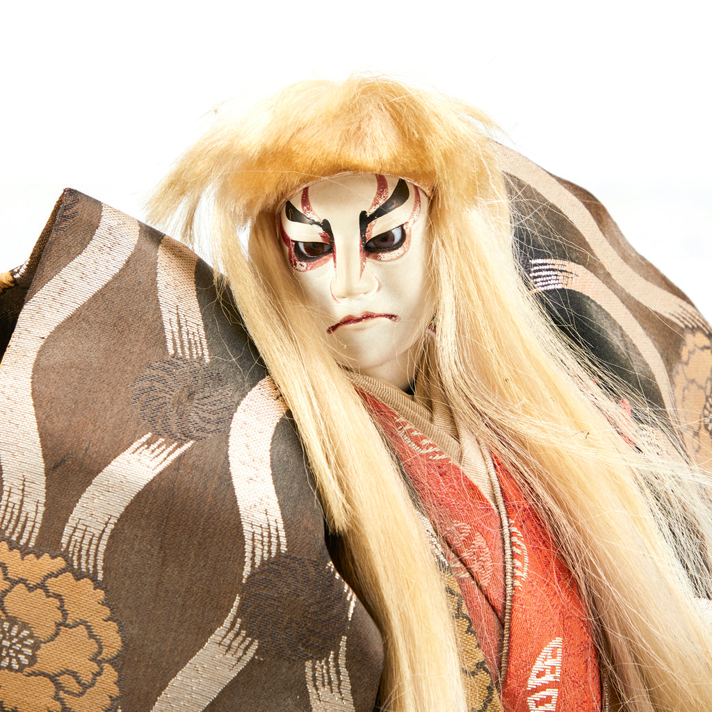 Tan and Brown Japanese Kabuki Doll