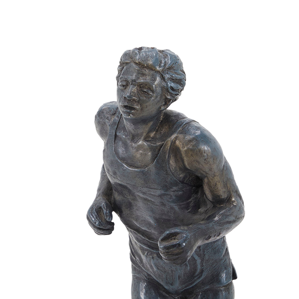 Iron Runner Statue