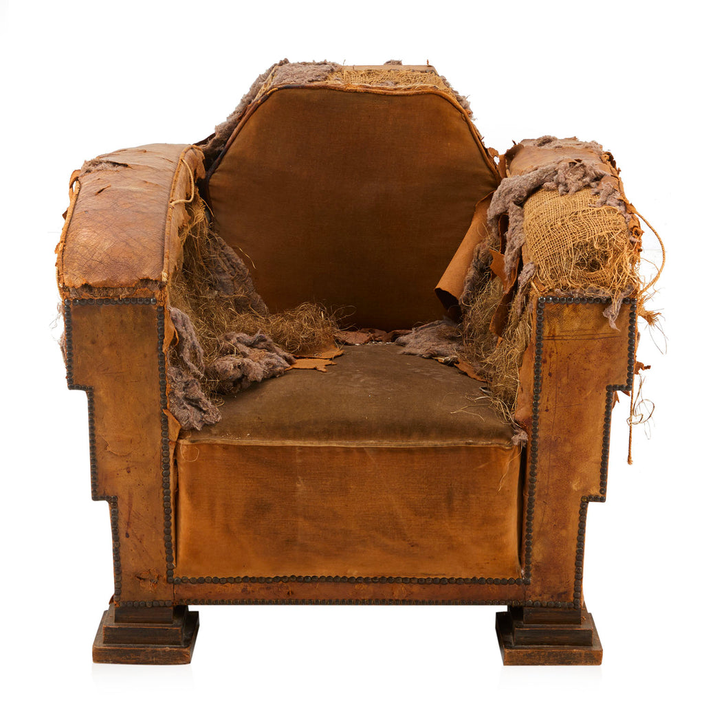 Heavily Distressed Brown Armchair