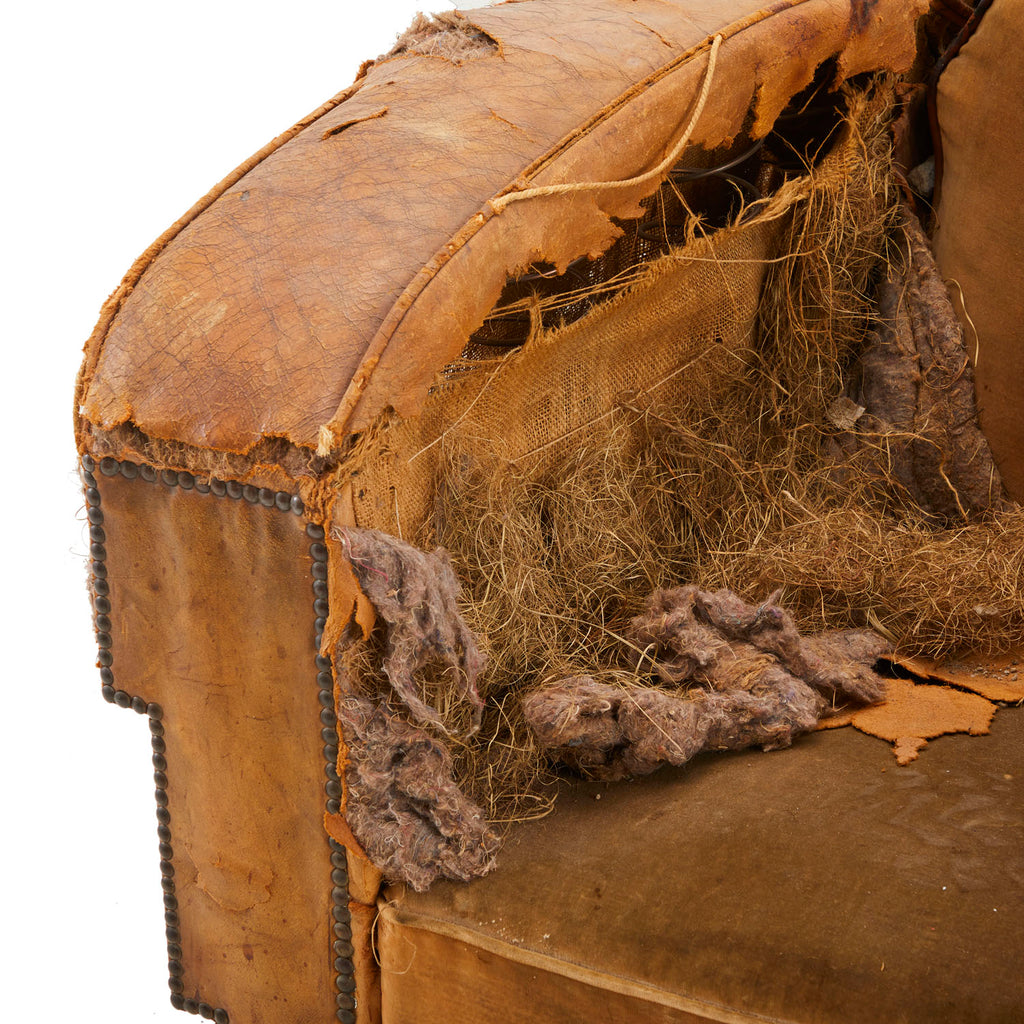 Heavily Distressed Brown Armchair