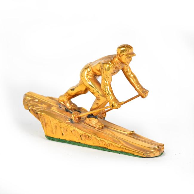 Gold Skier Statue